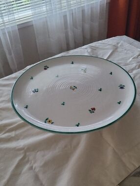 Scattered Blossoms. White Ceramic Cake Plate with Green Rim and Floral Motif.